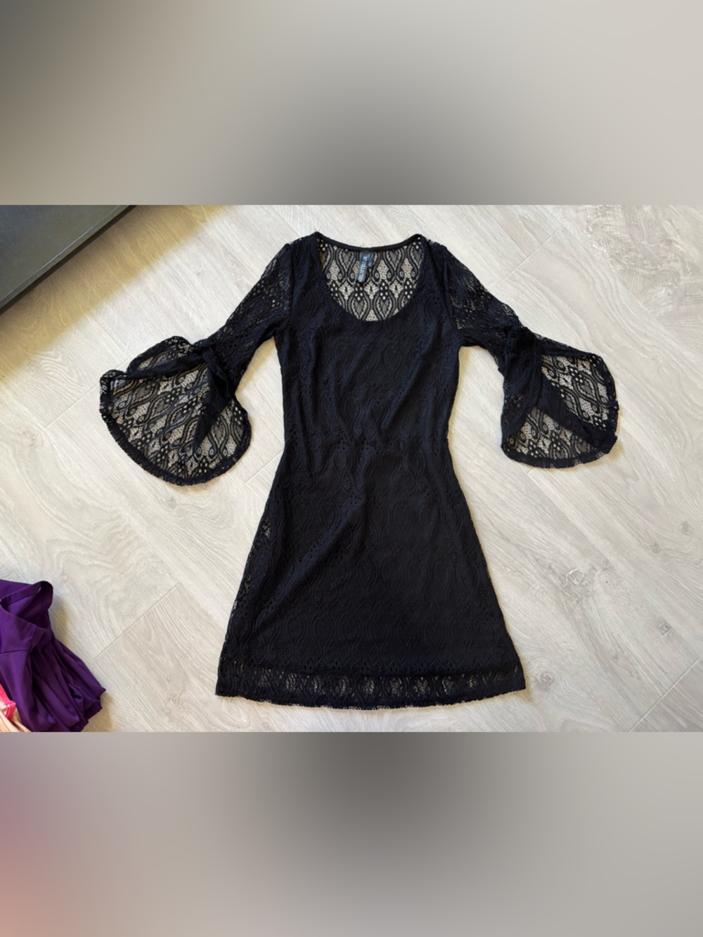 Black lacy dress with bell sleeves